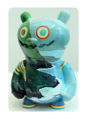 Turquoise and teal bear-like figure